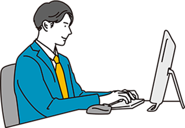 男性がPCに向かって作業している画像